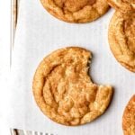 brown butter snickerdoodles without cream of tartar on parchment lined baking sheet
