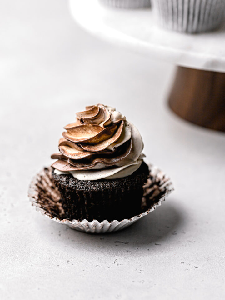 gluten free chocolate cupcake with liner pulled away from sides