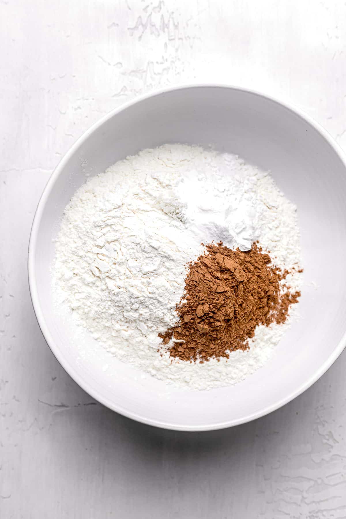dry ingredients in white bowl.