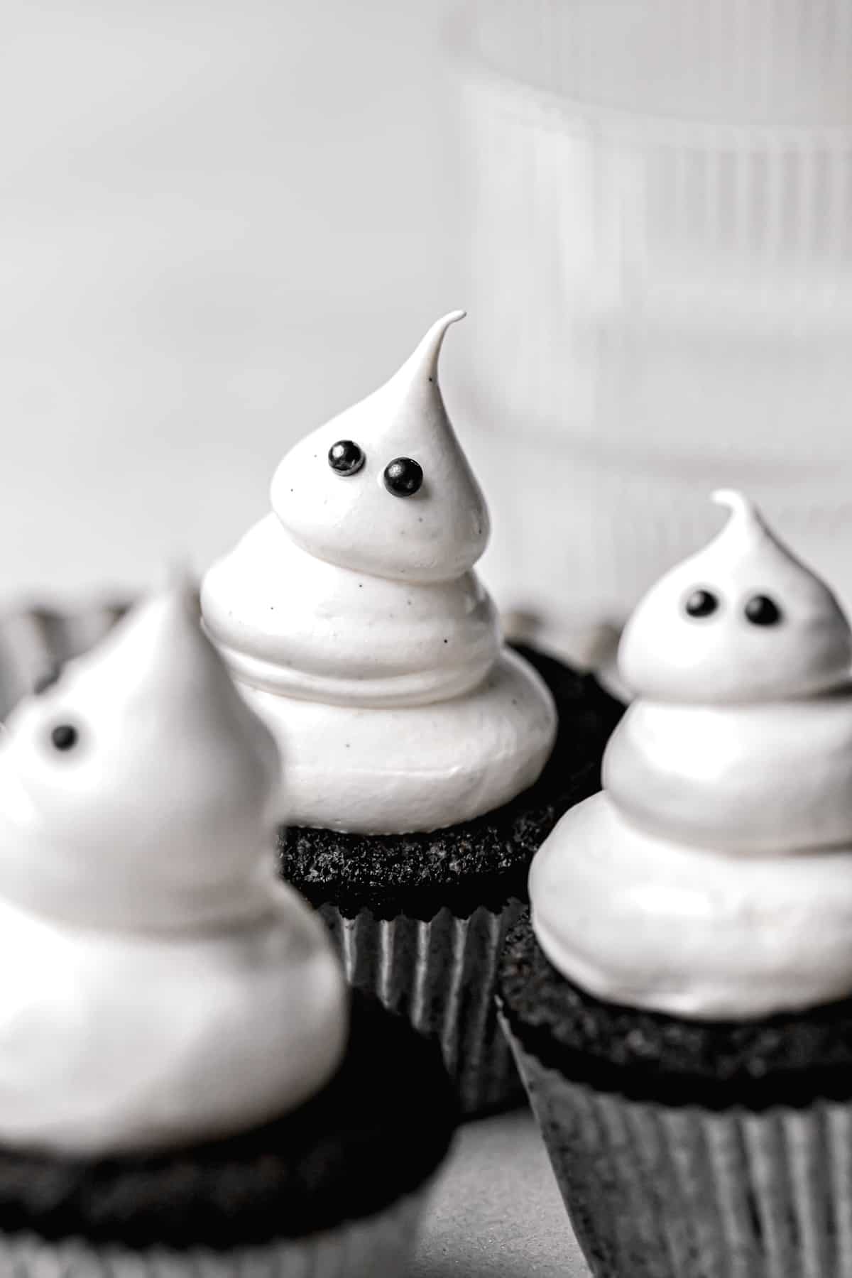 chocolate caramel cupcakes with meringue ghosts.