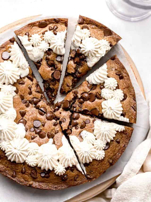 chocolate chip cookie cake with four slices cut