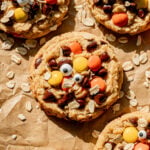 monster cookies on baking sheet.
