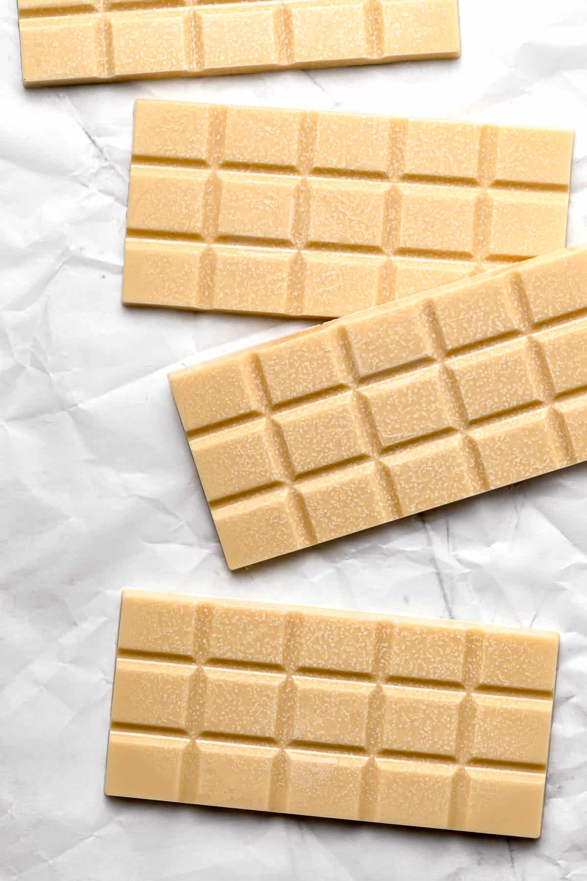 caramelized white chocolate bars on parchment paper.