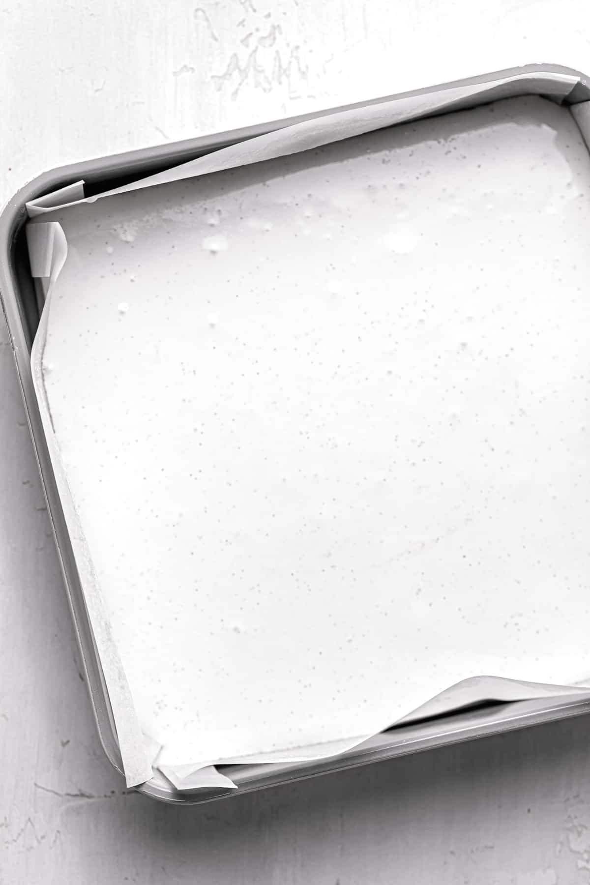 marshmallow mixture in square pan.