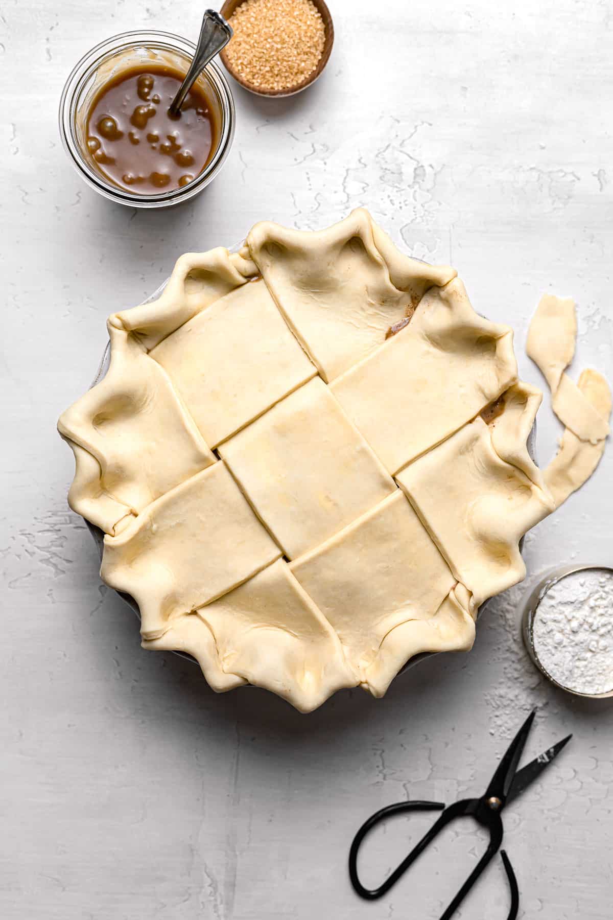 unbaked apple pie with lattice top.