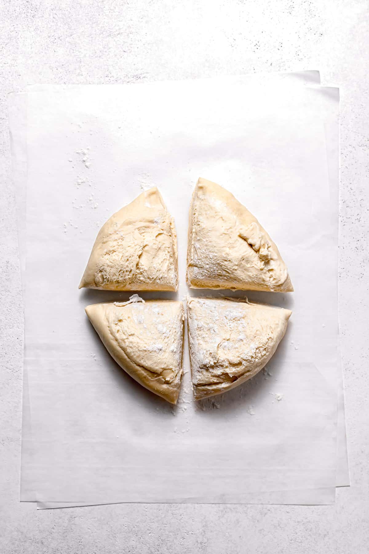 dough cut into four pieces