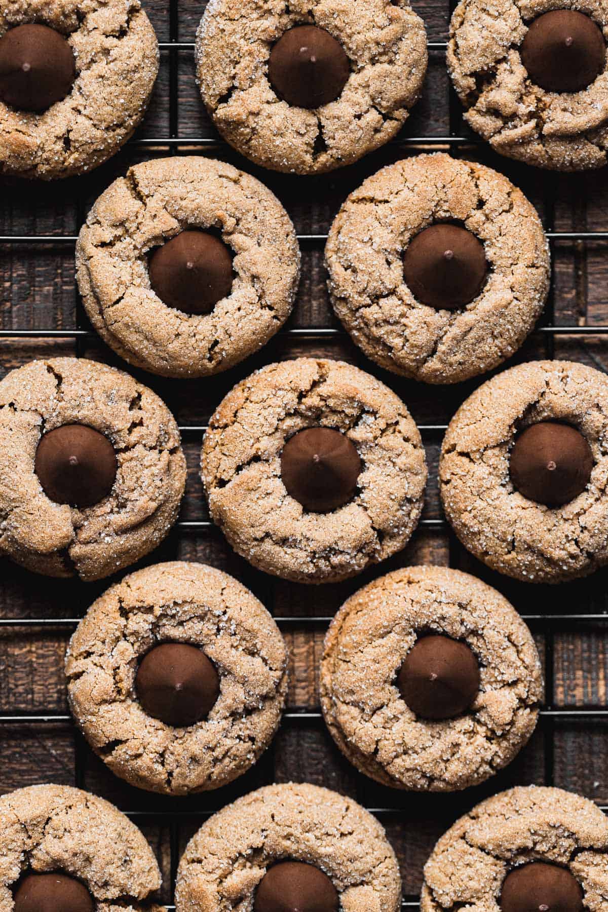 gluten free peanut butter blossoms lined up on wire rack