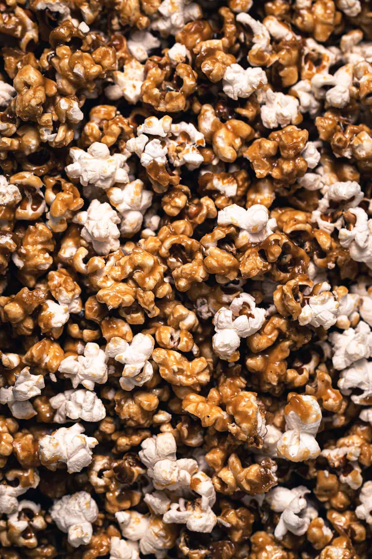 salted caramel popcorn on baking sheet.