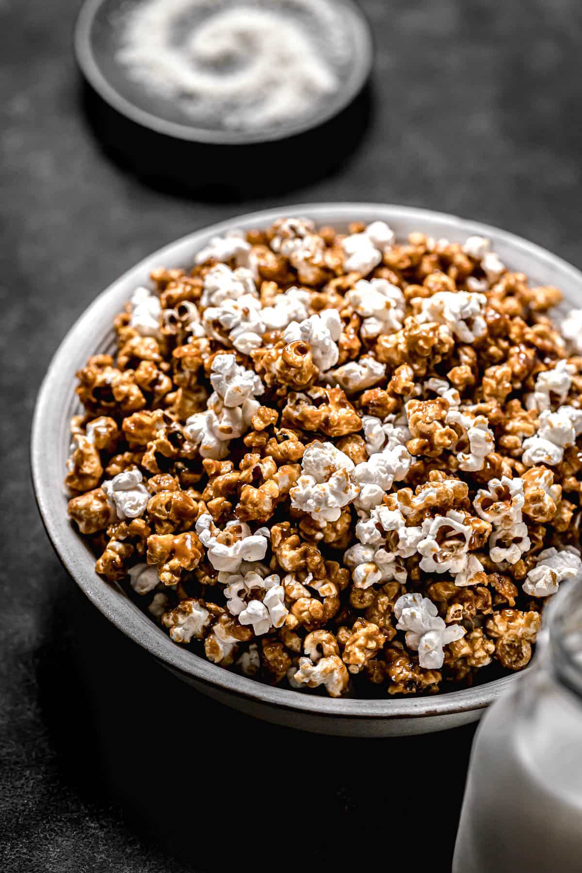 salted caramel popcorn in white bowl