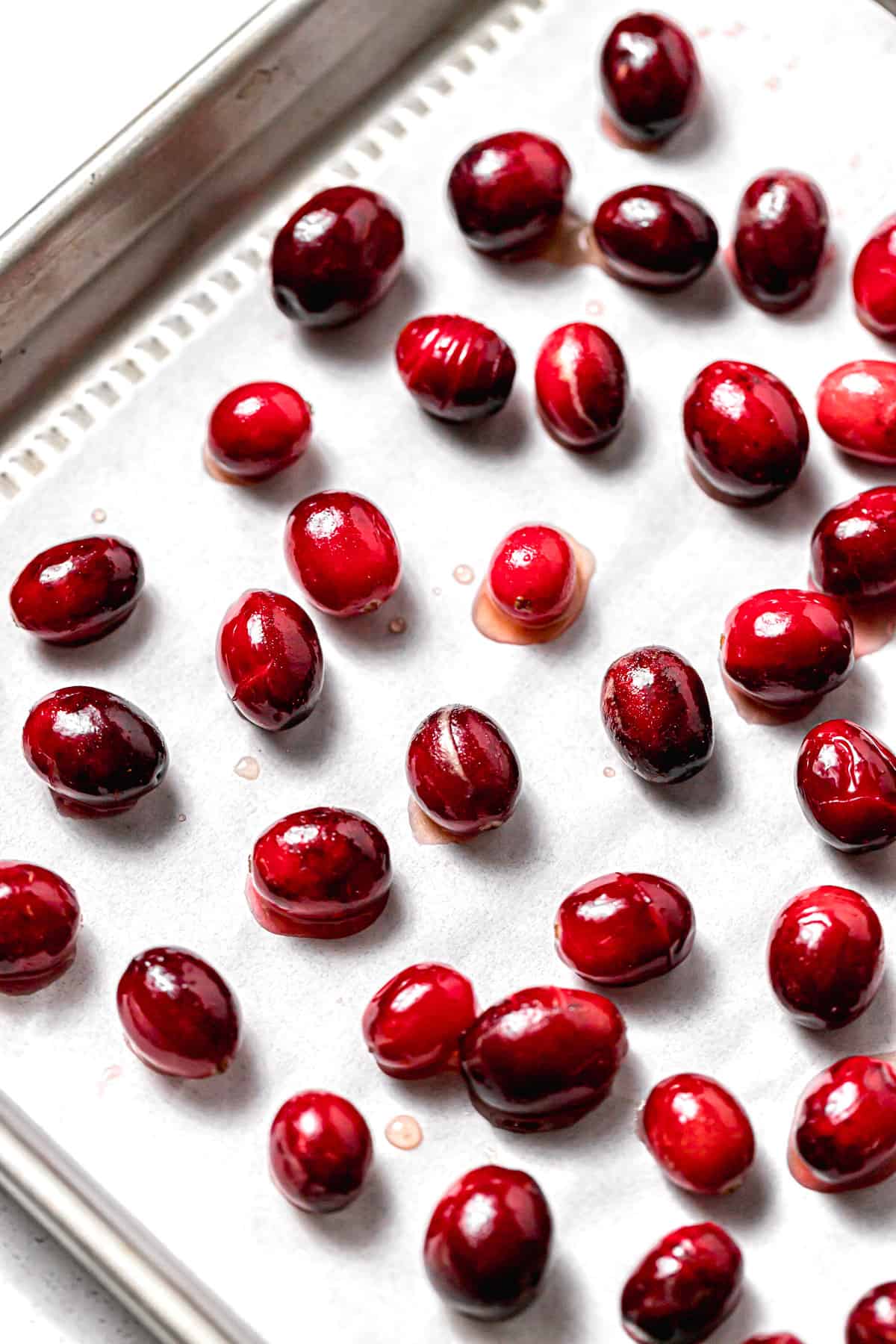 candied cranberries on baking sheet