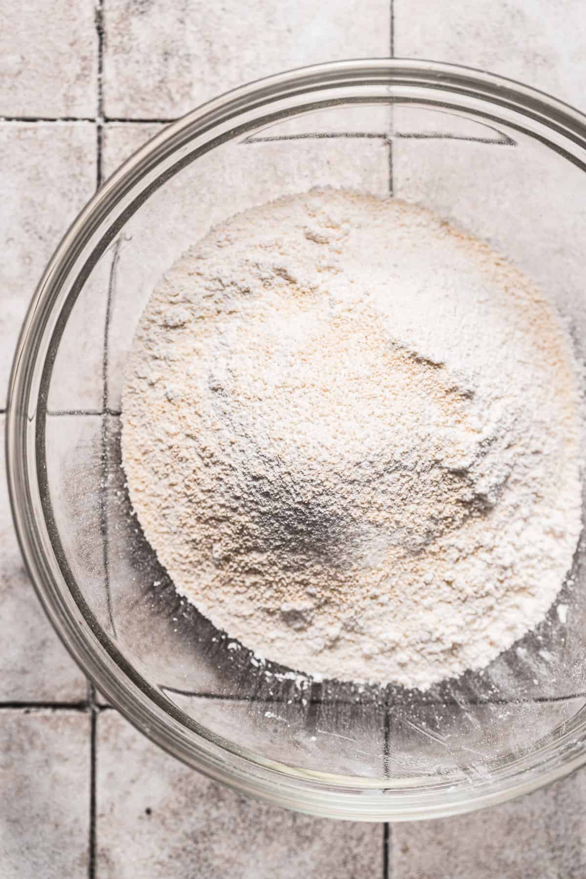 powdered sugar and almond flour in glass bowl.