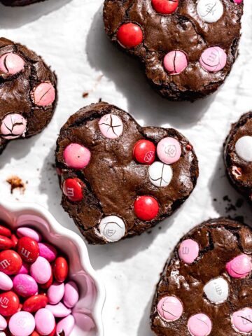 heart shaped valentine m&m brownies on parchment paper