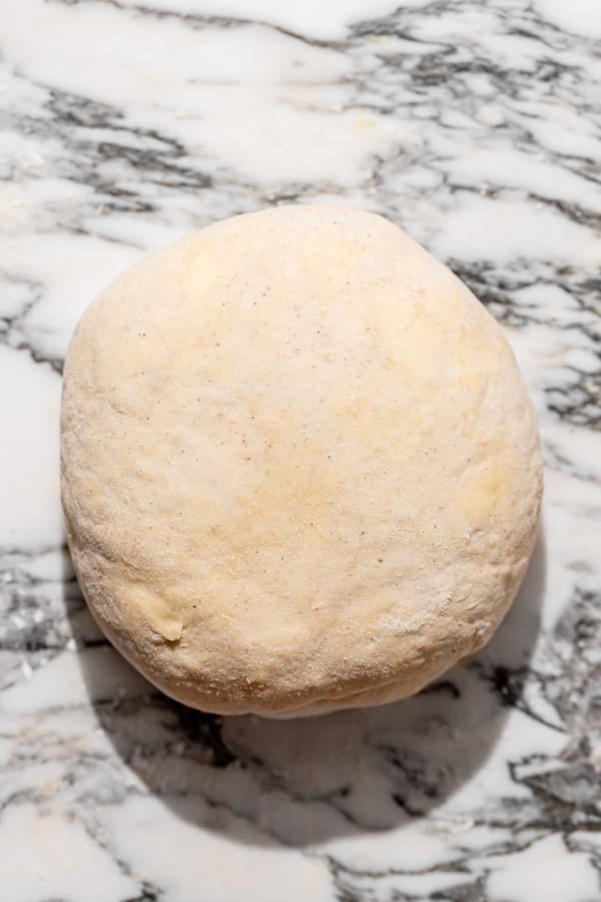 pie dough shaped into disk. 