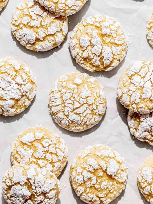 lemon crinkle cookies on baking sheet.
