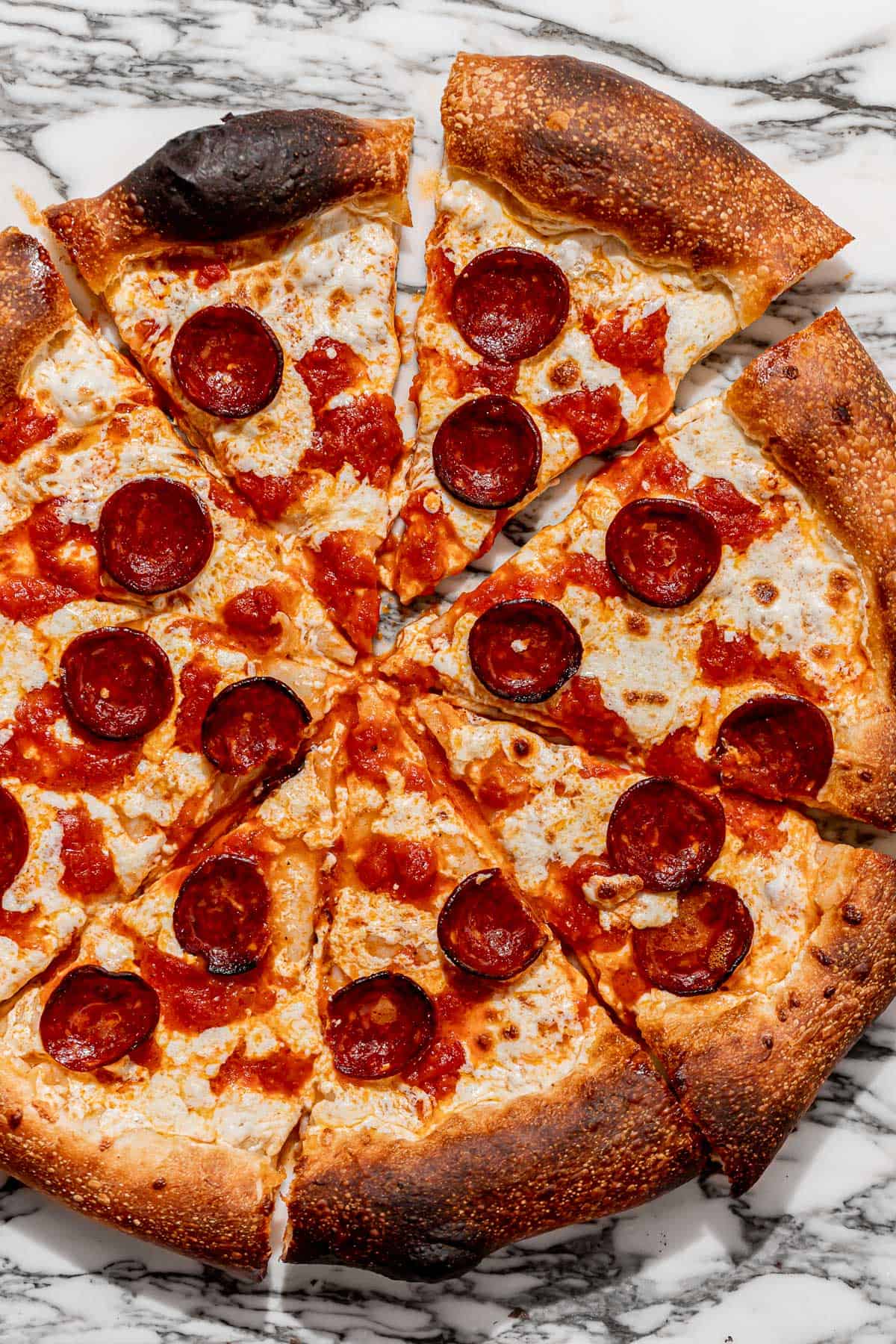 New York style pepperoni pizza cut into 8 slices.