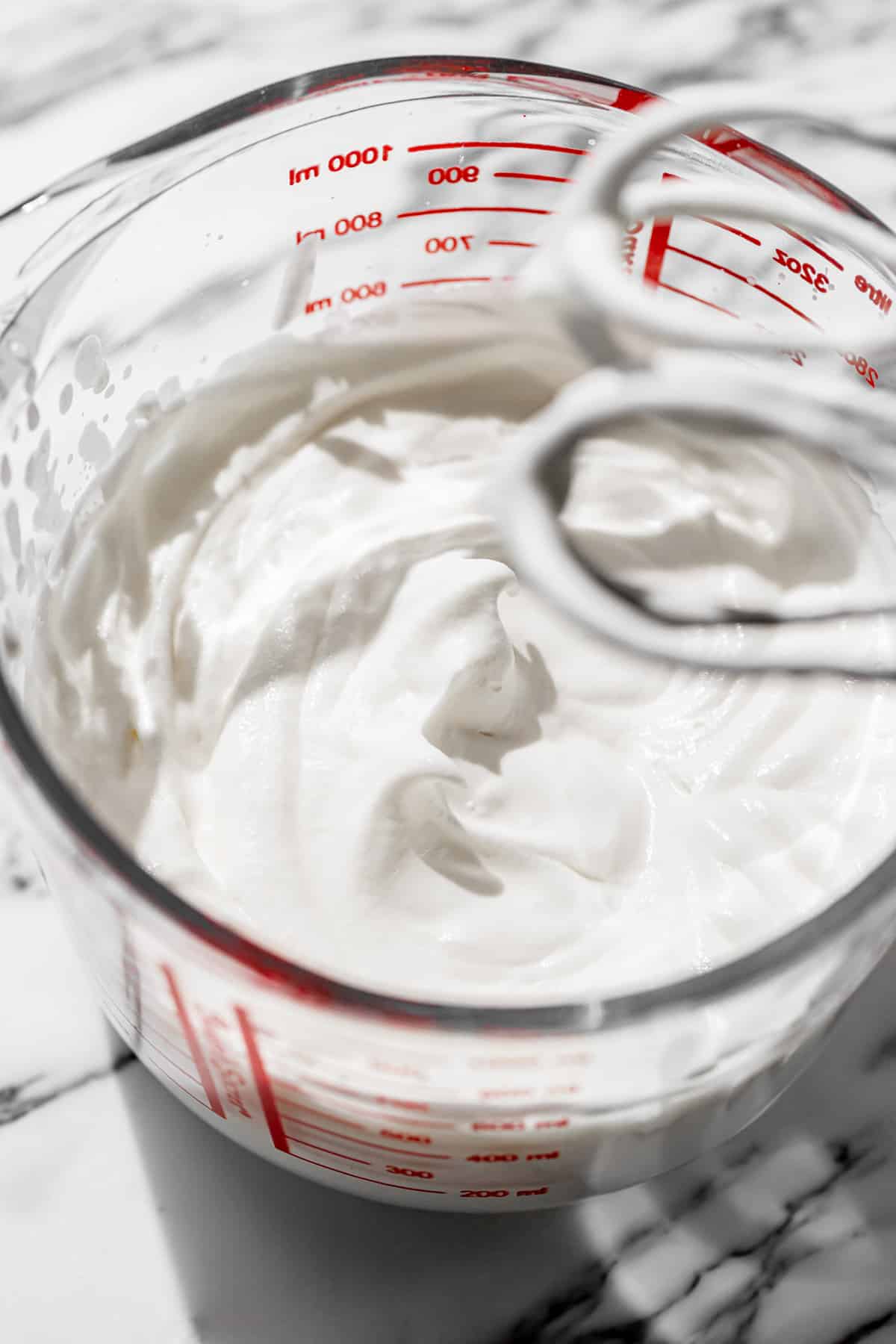 whipped cream in large measuring cup.