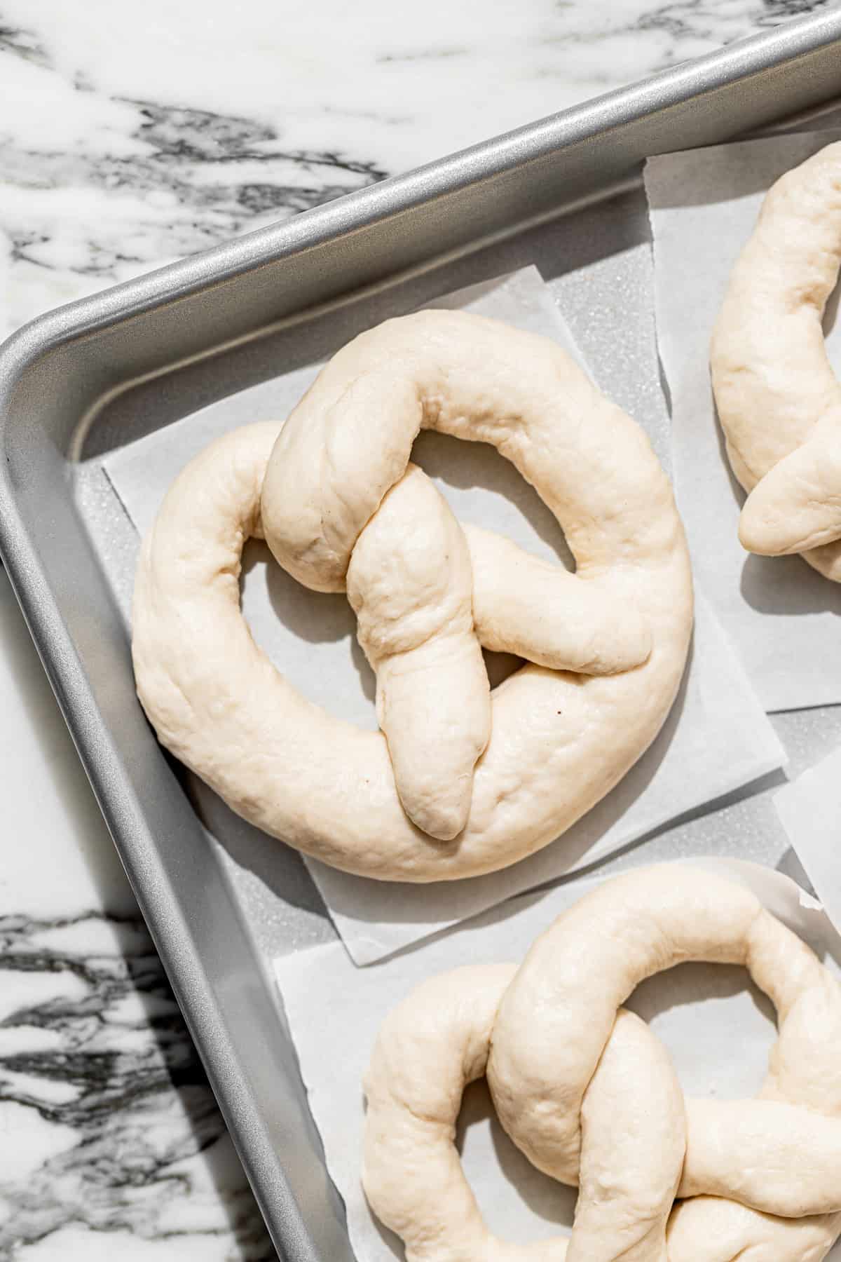 pretzel dough on baking sheet.