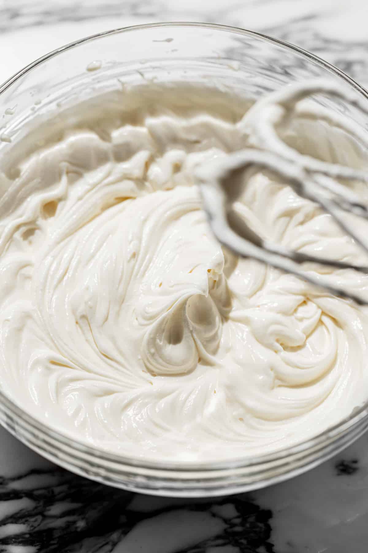 cream cheese filling in a glass bowl.