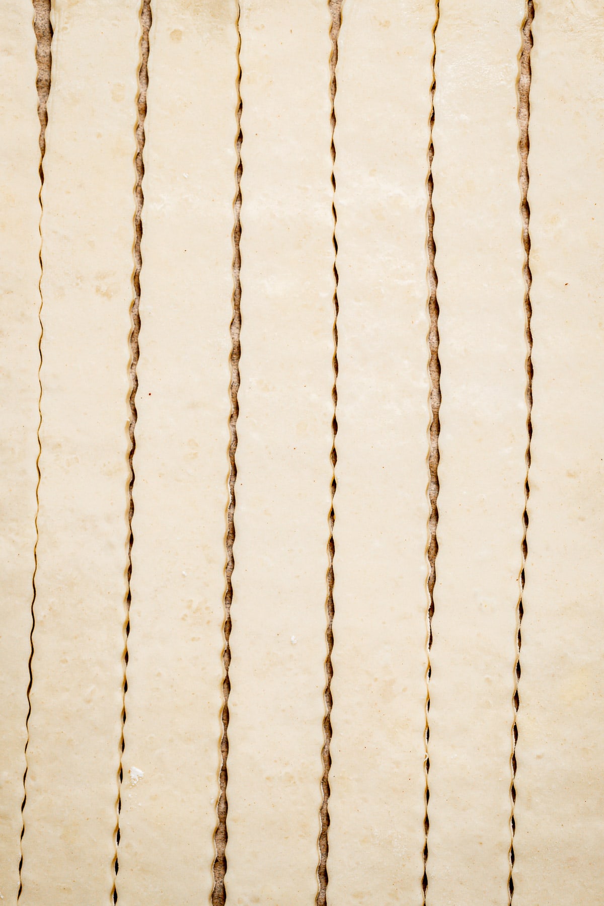 lattice strips cut into pie dough.
