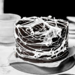 spider web cake on plate.