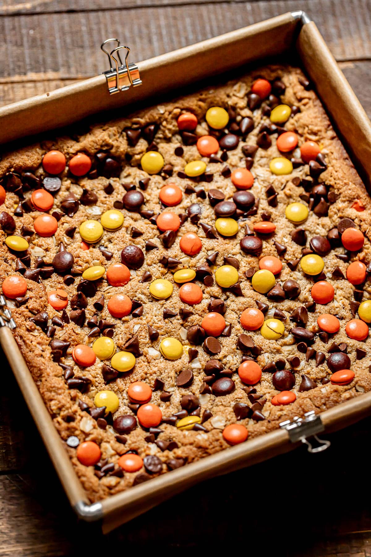 monster cookie bars in square pan.