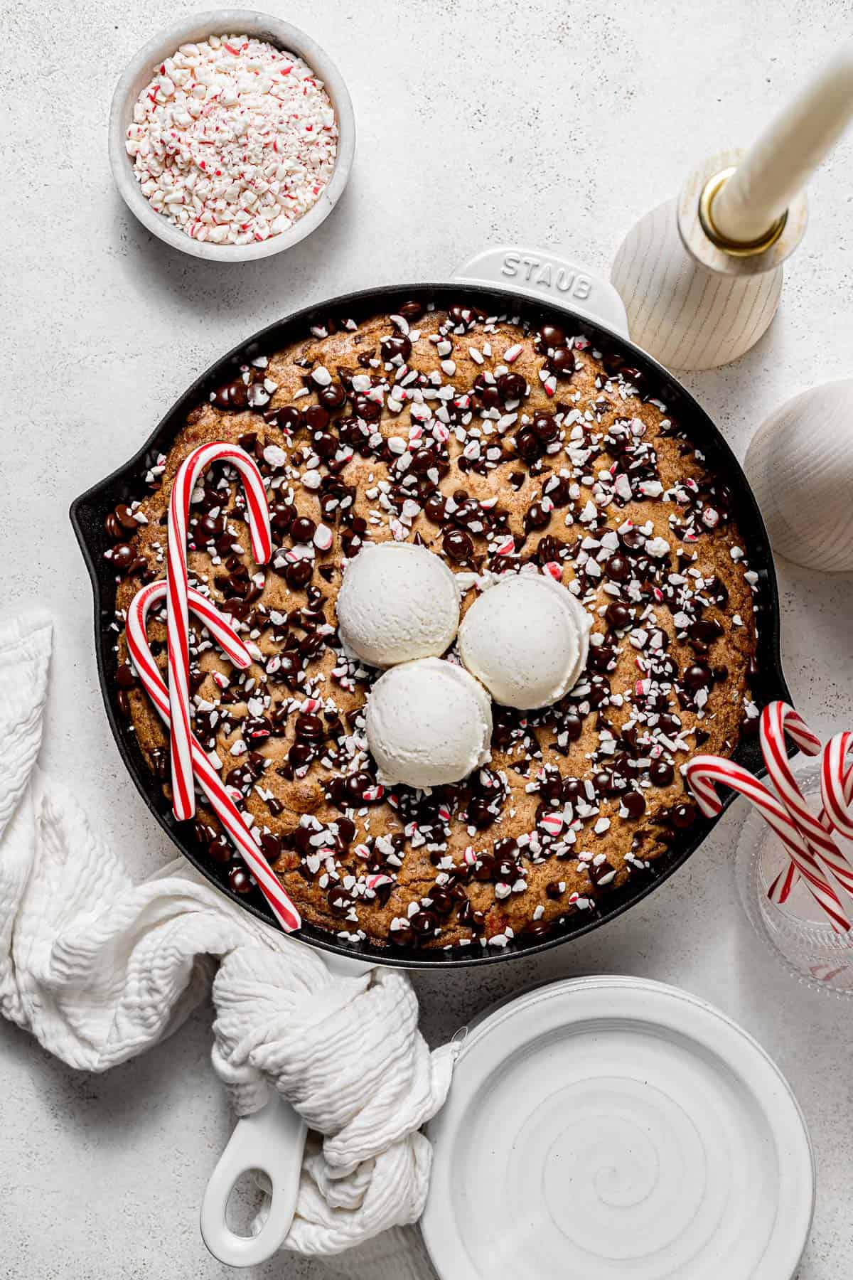 candy cane chocolate chip cookie skillet in cast iron skillet.
