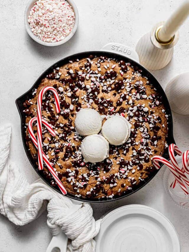 candy cane chocolate chip cookie skillet in cast iron skillet.