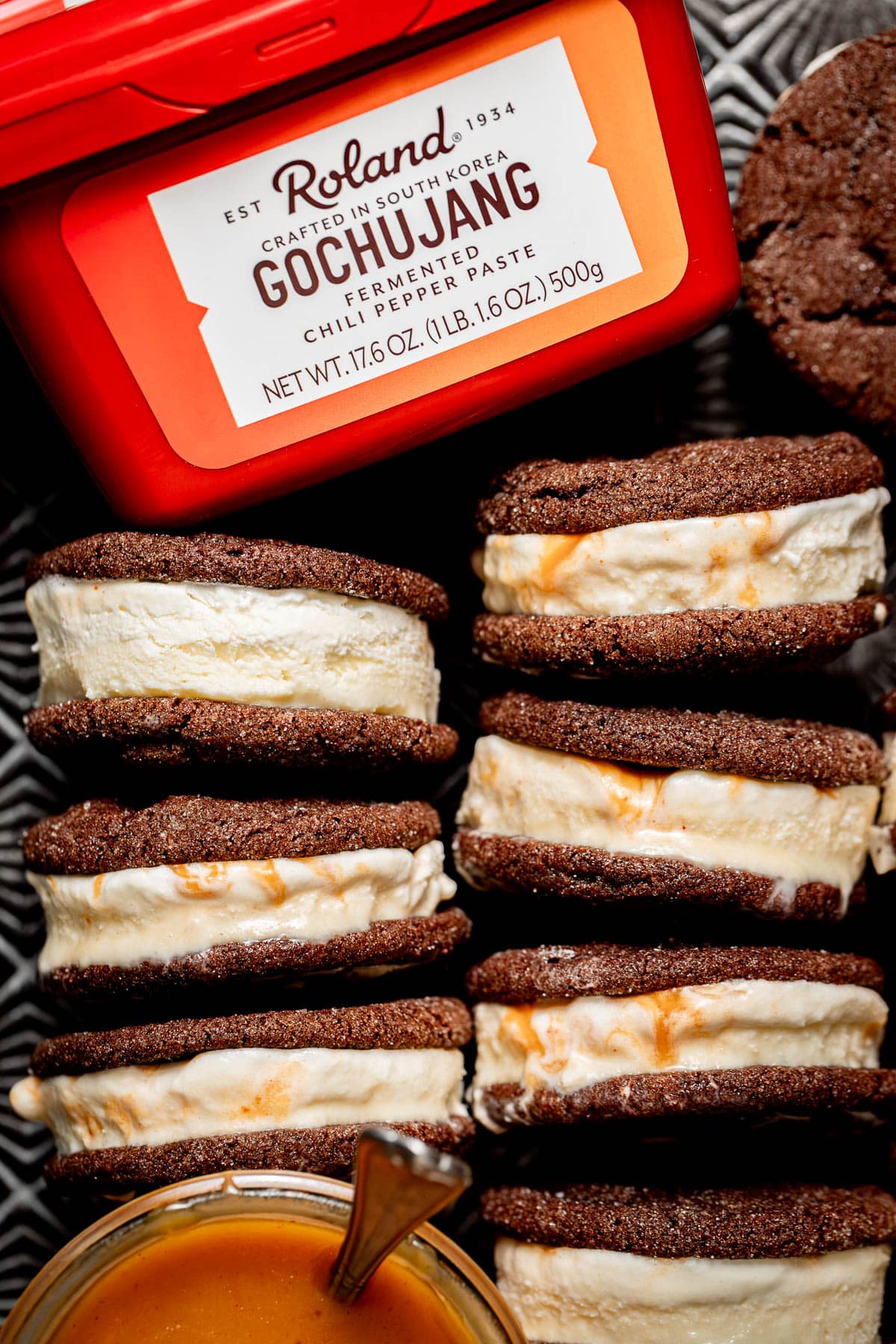 ice cream sandwiches lined up next to box of gochujang. 