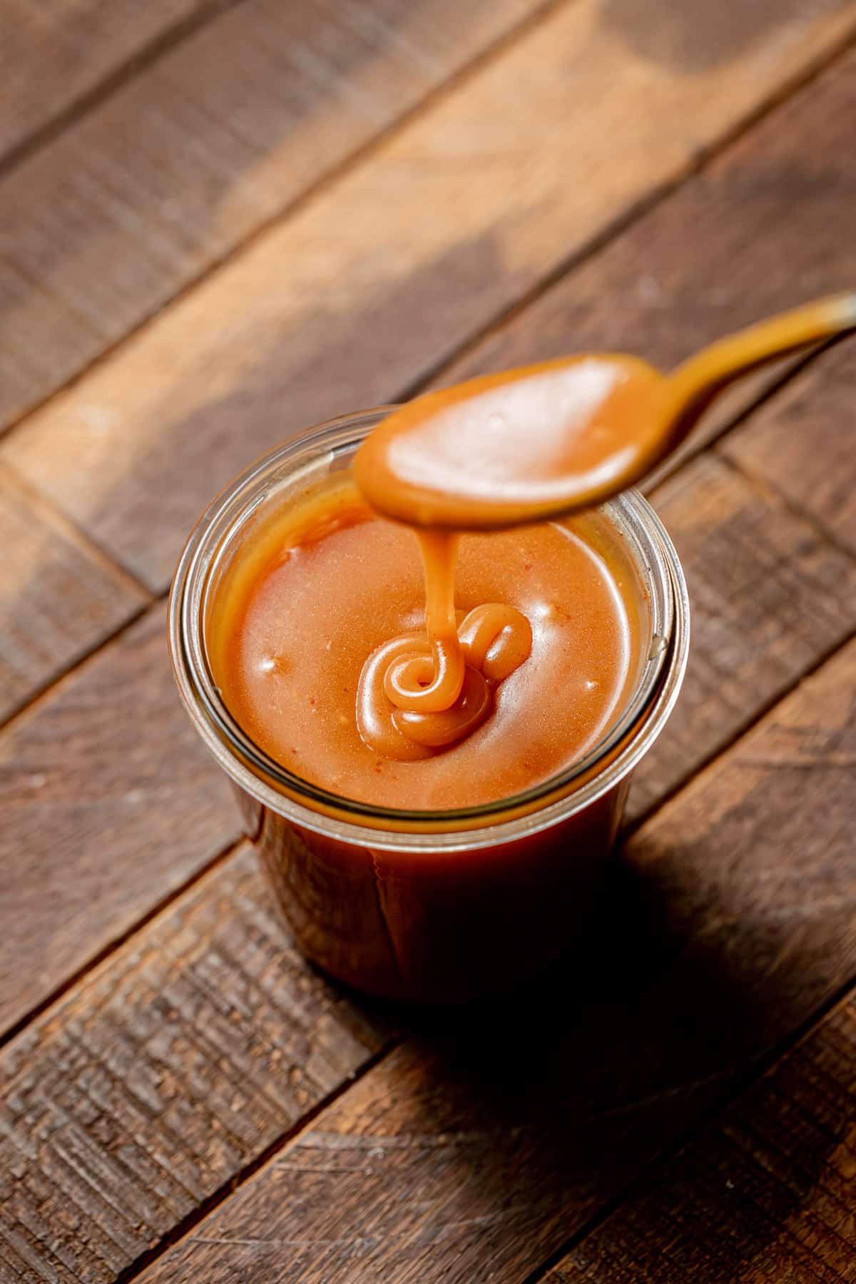 caramel sauce in jar.