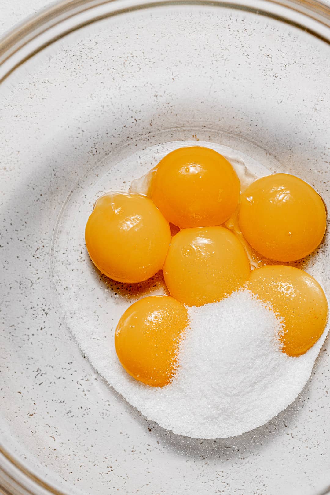 egg yolks and sugar in small bowl.