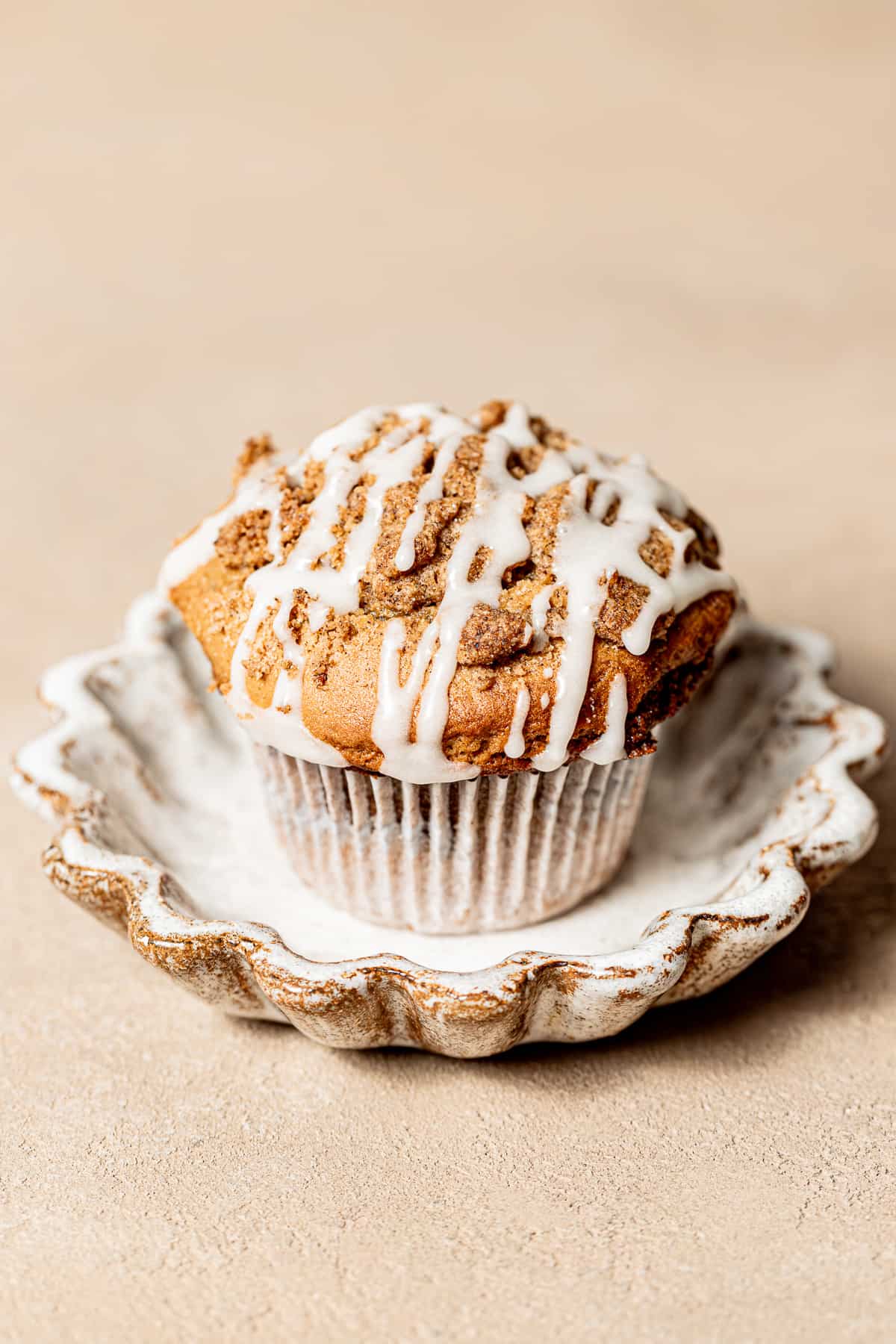 coffee coffee cake muffin on small plate.