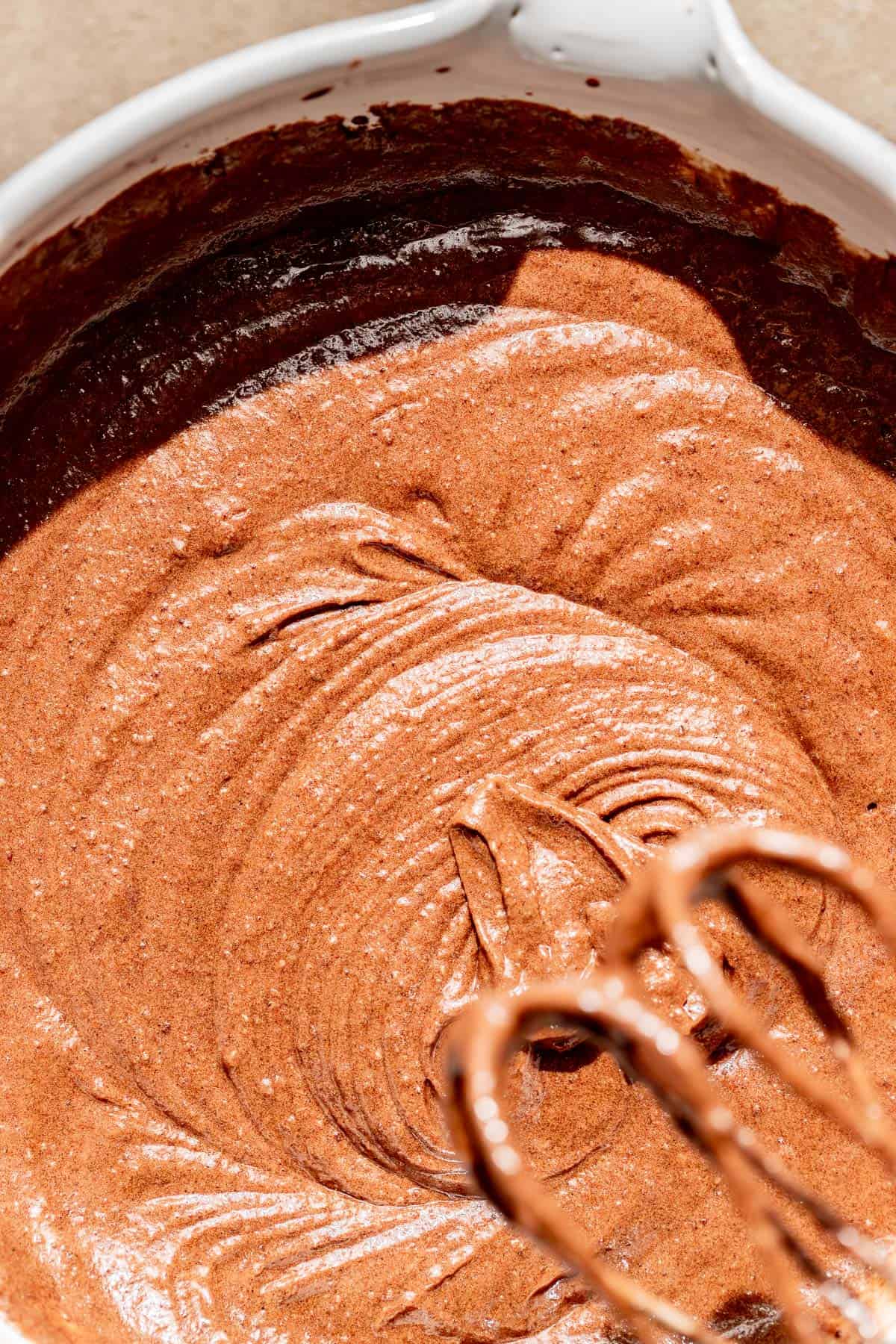 chocolate cake batter mixed in large bowl.
