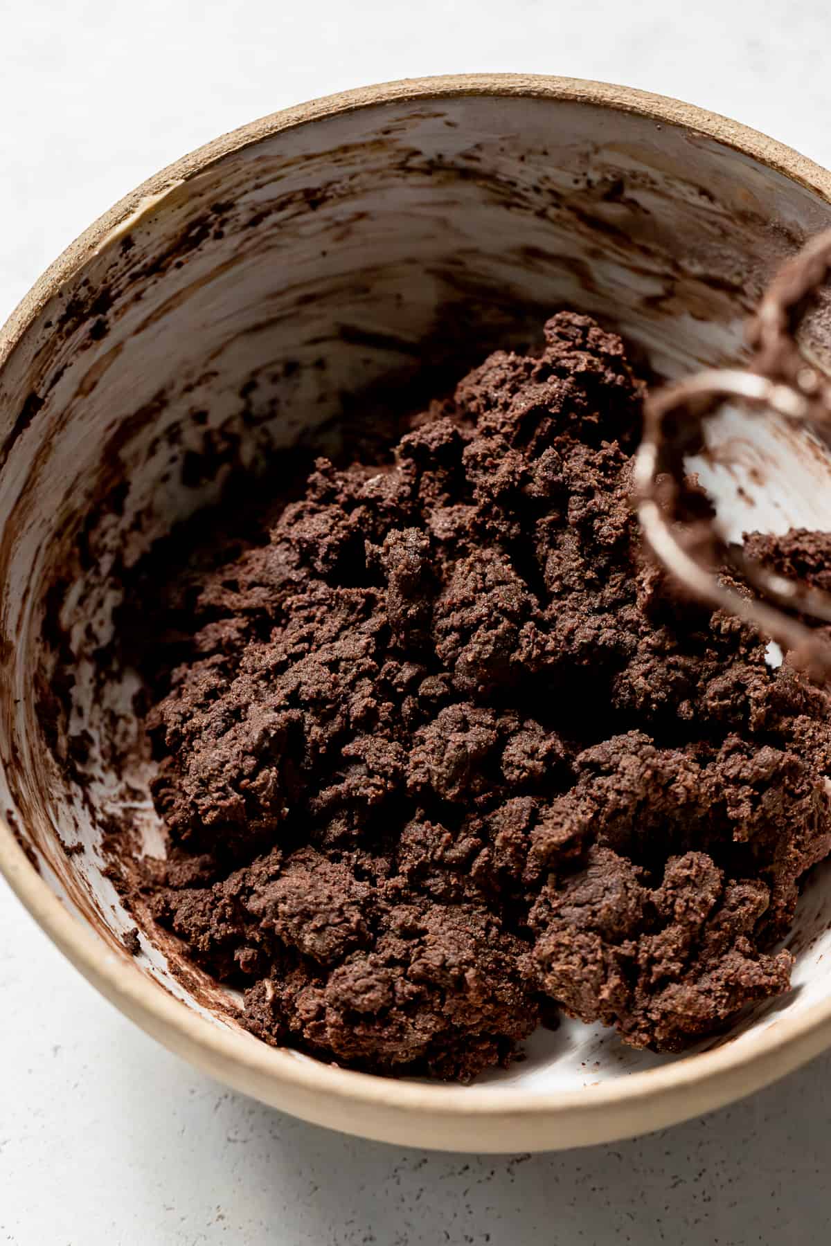 chocolate shortbread ingredients mixed in bowl.