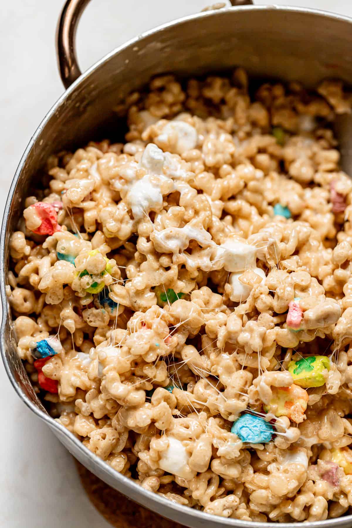 lucky charms Rice Krispies mixture in saucepan.