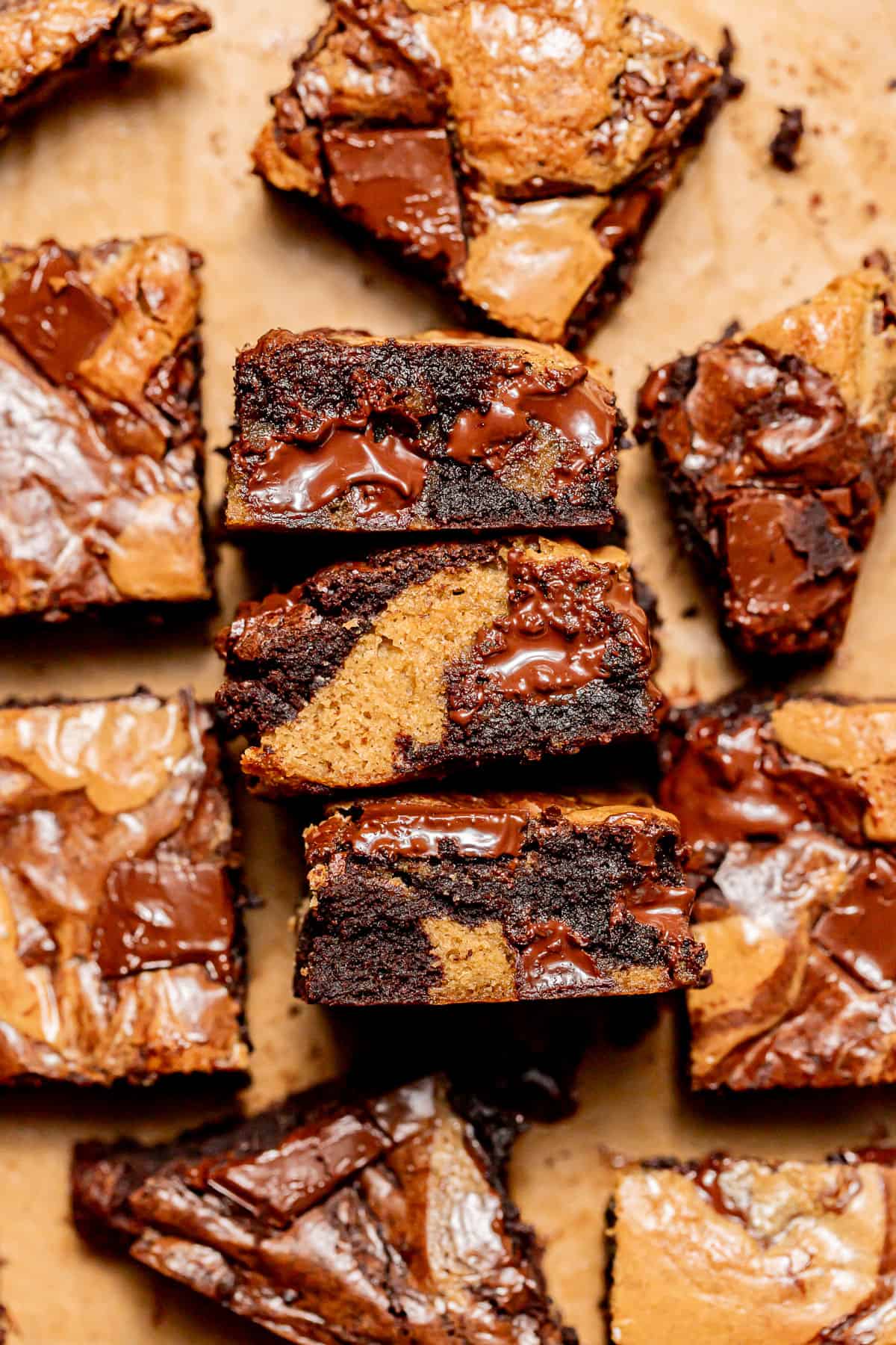 brownie blondies on sides on parchment paper.