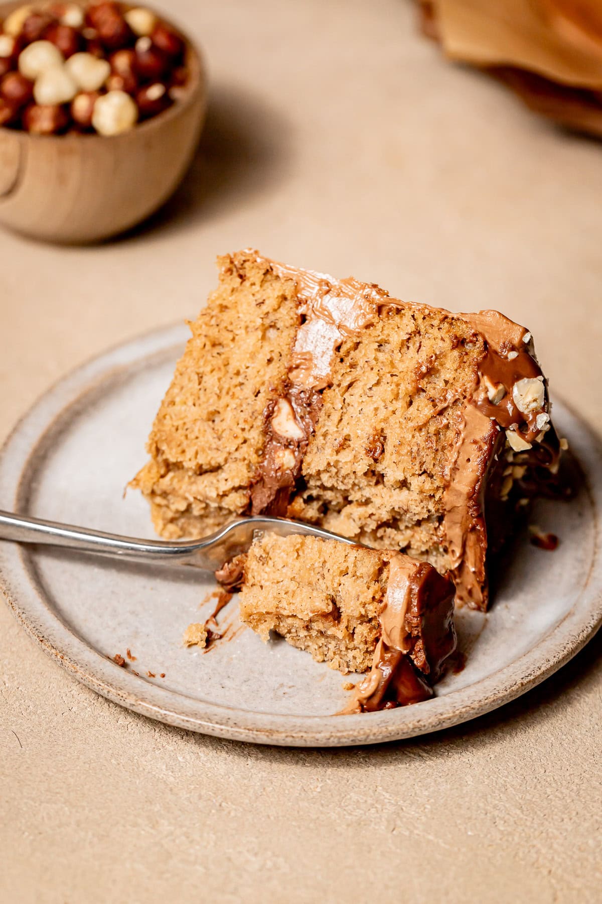 slice of banana nutella cake on plate.