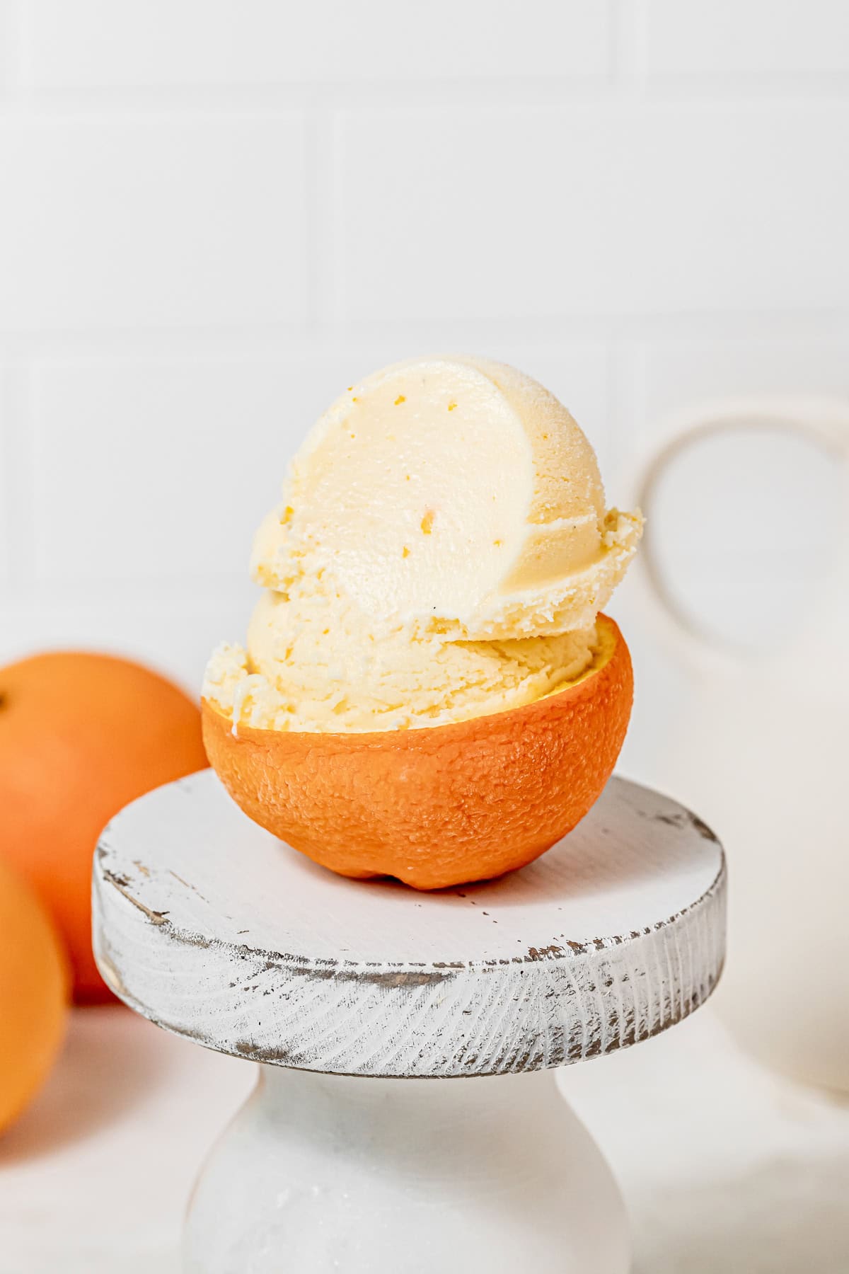 orange sherbet in orange peel bowl. 