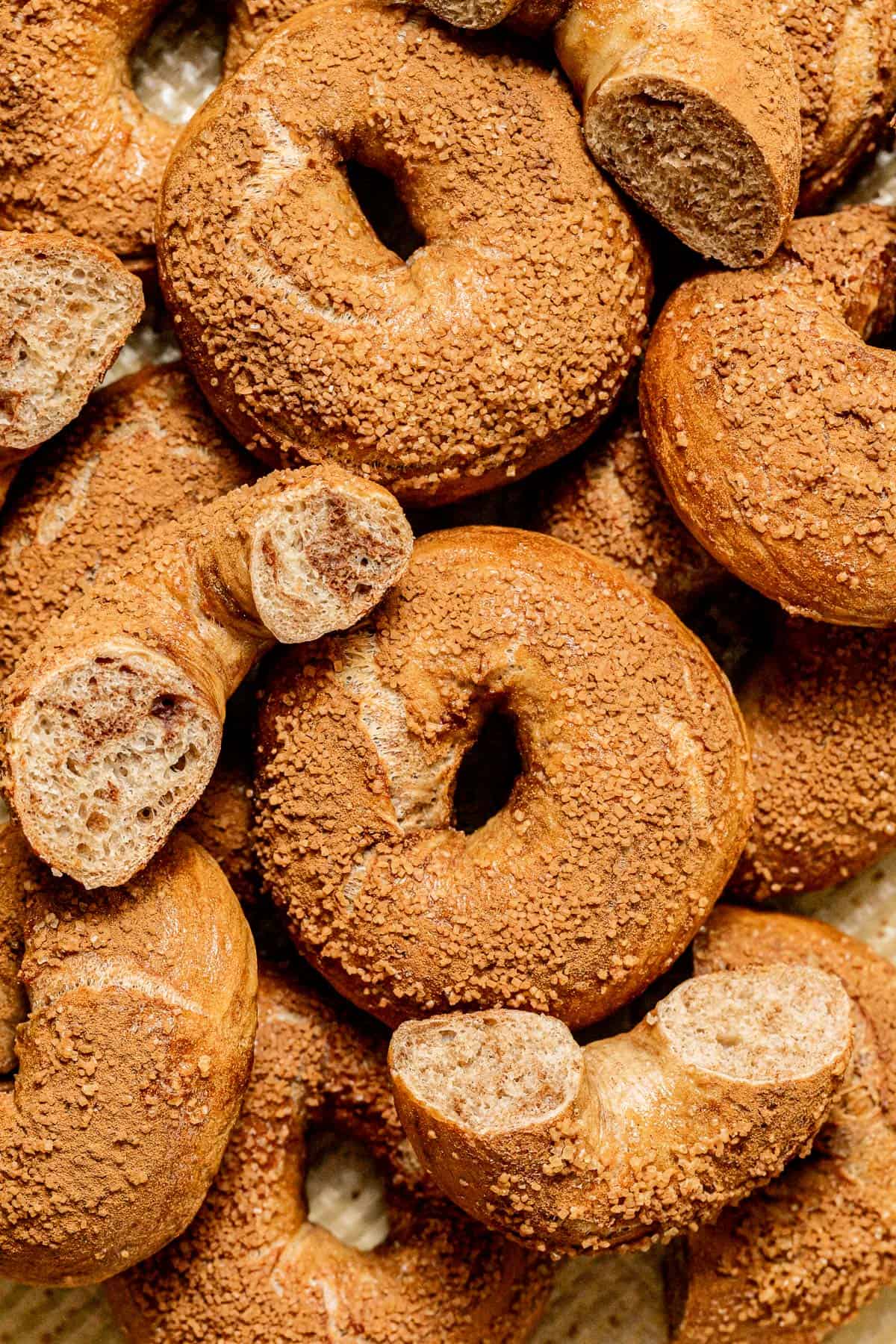 baked Cinnamon Swirl Bagels in pile.