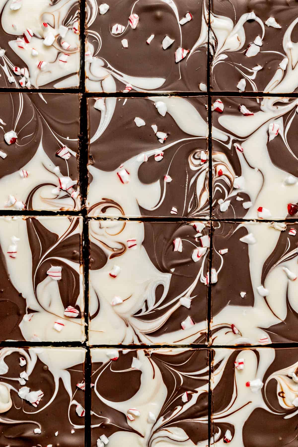 Peppermint Bark Brownies cut into individual squares.