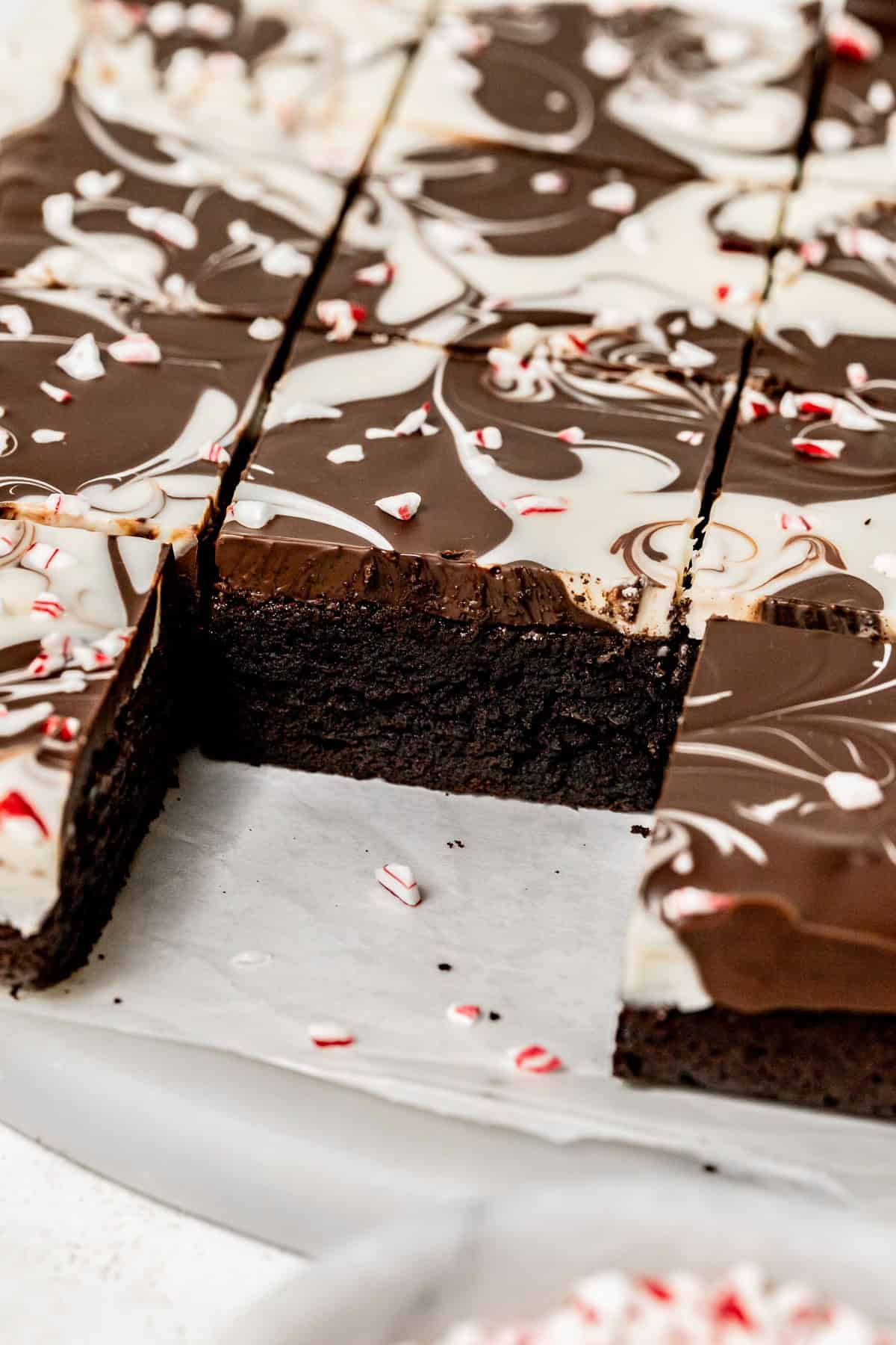 Peppermint Bark Brownies on marble slab.