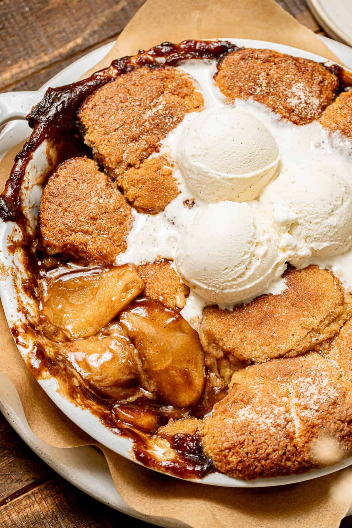 Cinnamon Sugar Apple Cobbler with vanilla ice cream on top.