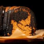 chocolate pumpkin cake cut to show inside swirl.