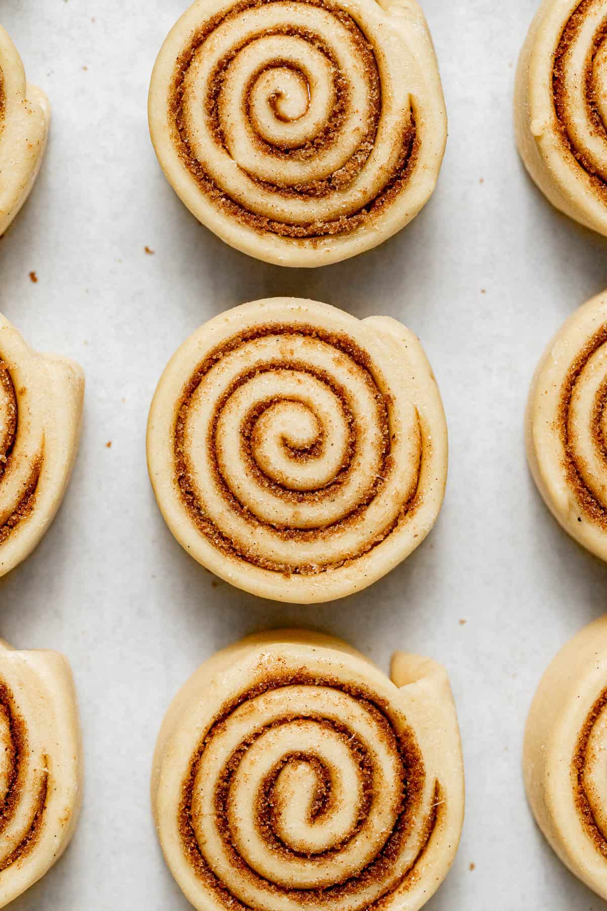 unbaked Eggnog Cinnamon Rolls in pan.