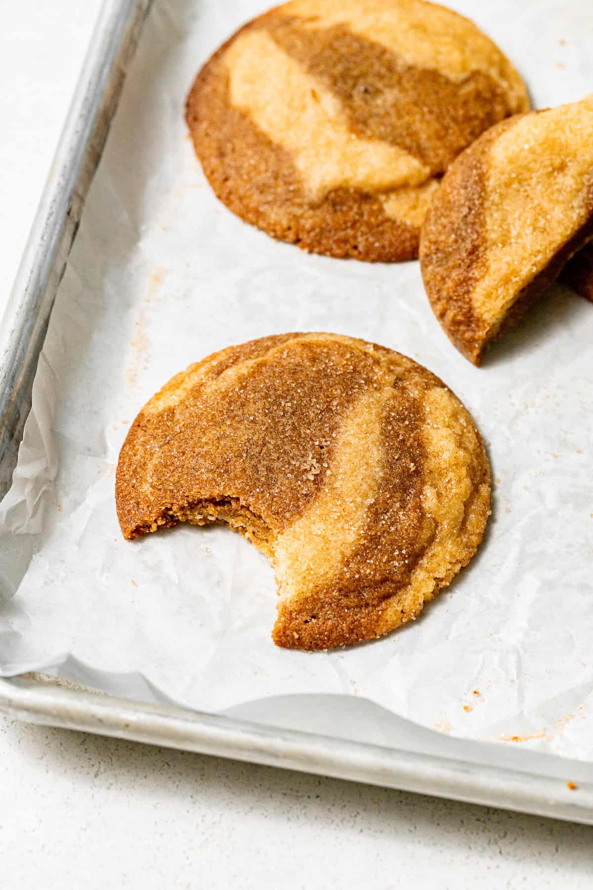 marbled snickerdoodle on baking sheet.