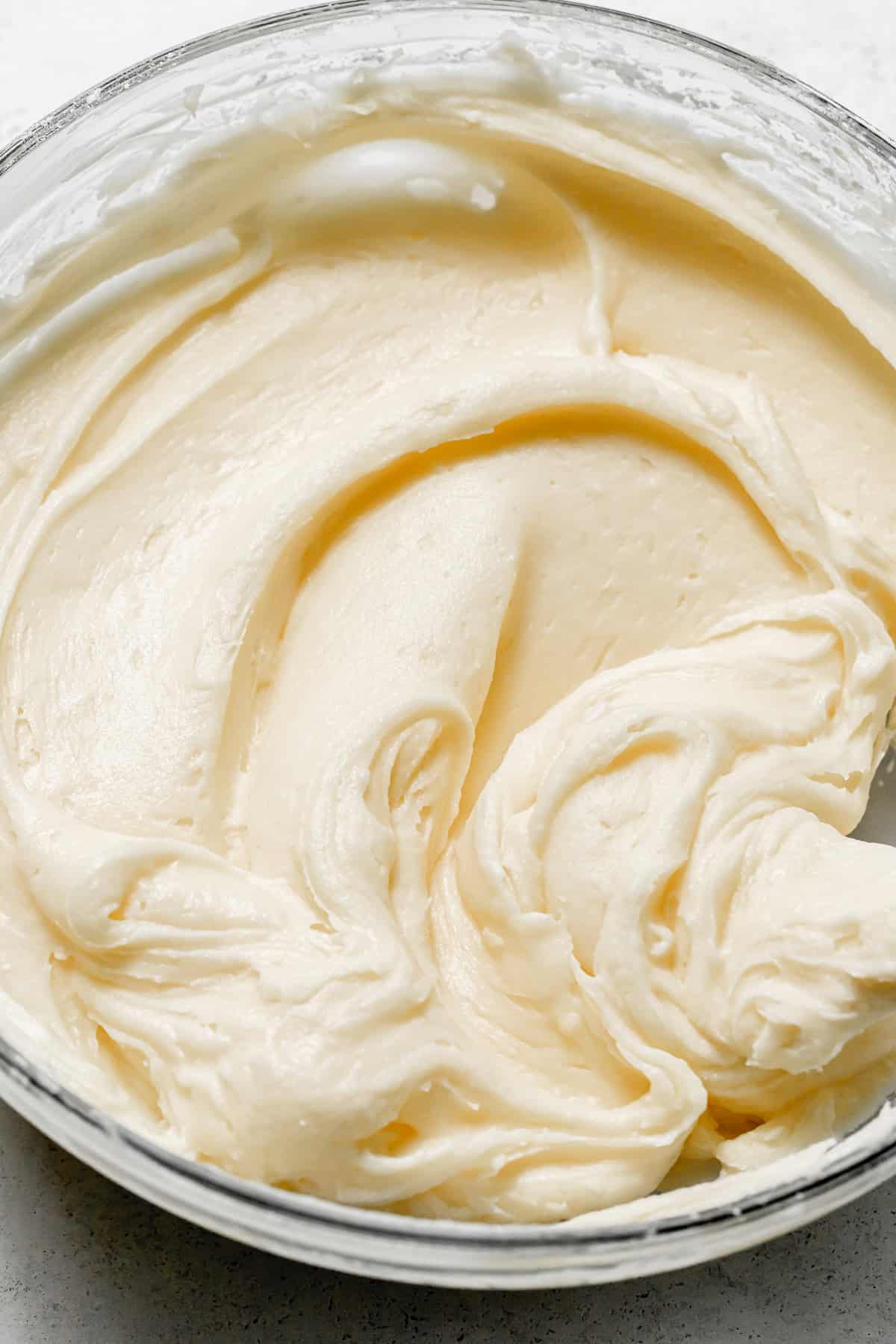 cream cheese frosting in bowl.