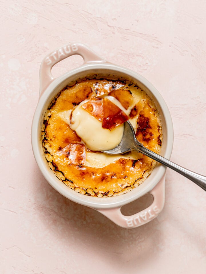 single serve creme brûlée with spoon.