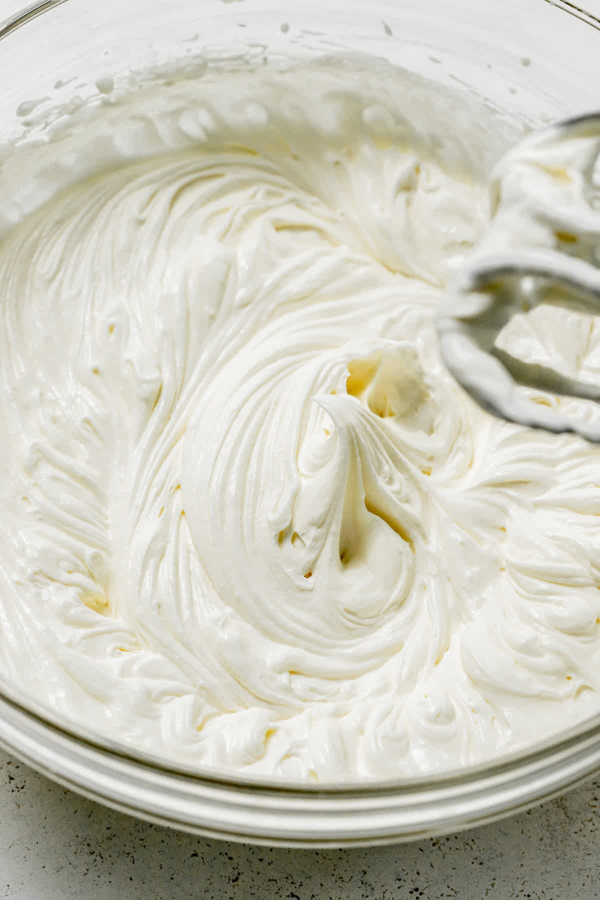 whipped mascarpone frosting in bowl.