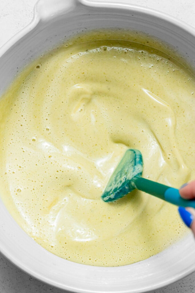 pistachio ice cream mixture in bowl.