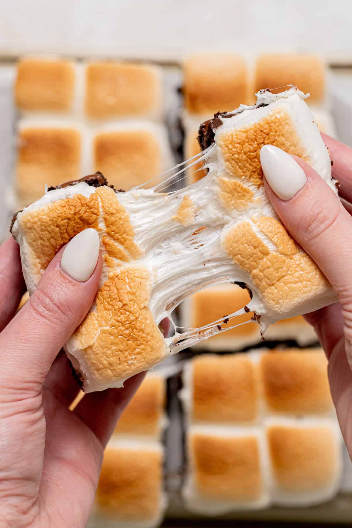 s'mores brownie being pulled apart.