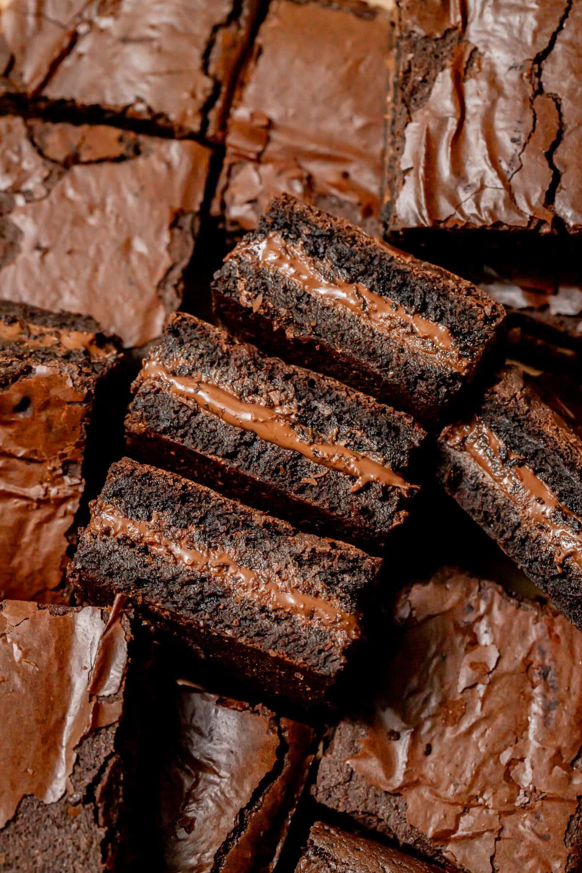 Nutella Brownies in line on parchment paper.